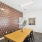 Room with table and wall with wallpaper
