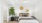 Styled bedroom with large faux tree